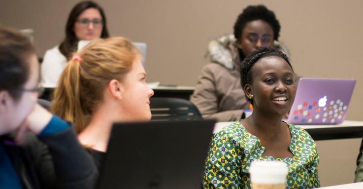 Global Health students attend an HIV/AIDS class at the School of Public Health, Fall 2015. Students in a classroom