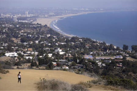 Pacific Palisades — A hiker walks along Los Leones Trail in August 2021. (Genaro Molina / Los Angeles Times)