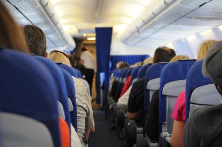 Photo of people in an airplane