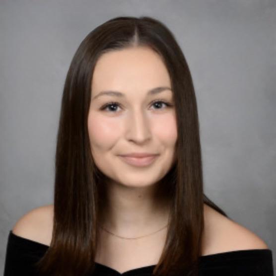 Headshot of Brooke Erickson wearing professional attire. 