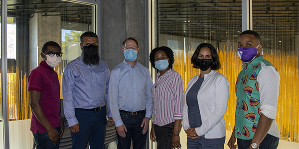 The inaugural class of the Doctor of Global Health Leadership and Practice program. From left to right: Eliud Akama, Anwar Parvez Sayed, Lee Pyne-Mercier, Phiona Marongwe, Raquel Sanchez, Stelio Tembe