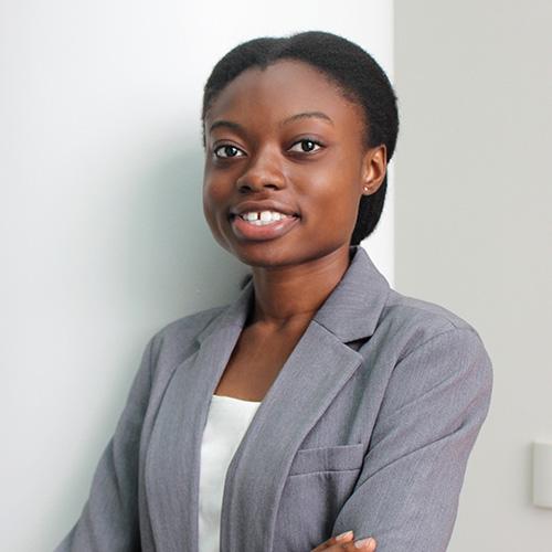 Headshot of Deborah Olapido wearing professional attire.