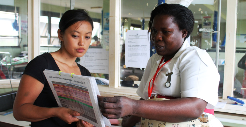 Fan Lee with Nurse in Uganda