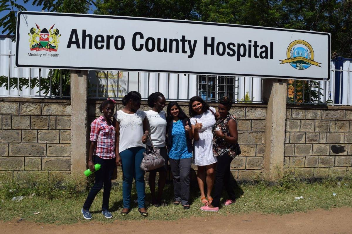 Photo of Rubee Dev and Shiza Farid with colleagues at the Ahero County Hospital in Kenya