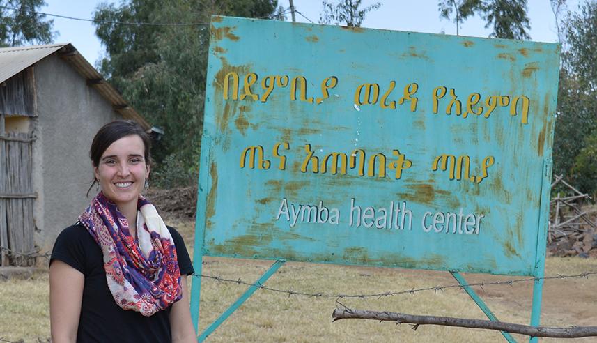 Anna Bazinet in front of Clinic