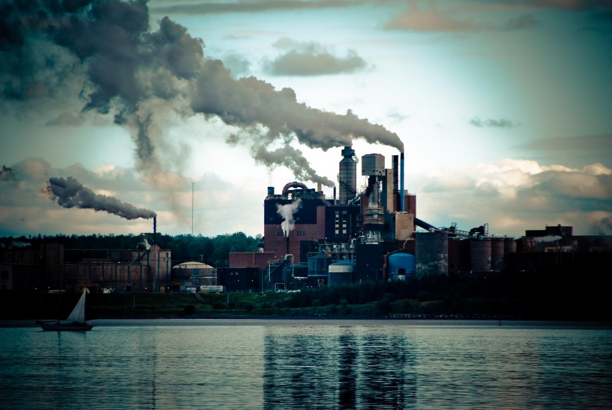 Photo of a factory creating pollution