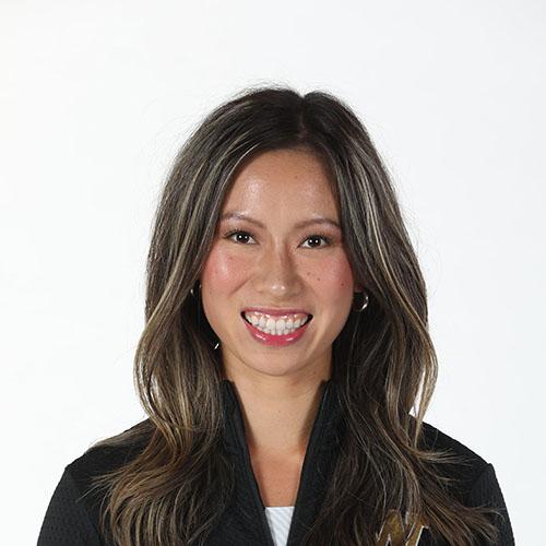 Headshot of Samantha Tran smiling in professional attire.