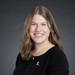 Headshot of Tessa Concepcion wearing professional attire.