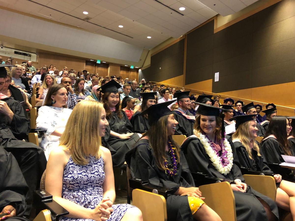 Graduates sit in Kane Hall during the 2019 ceremony