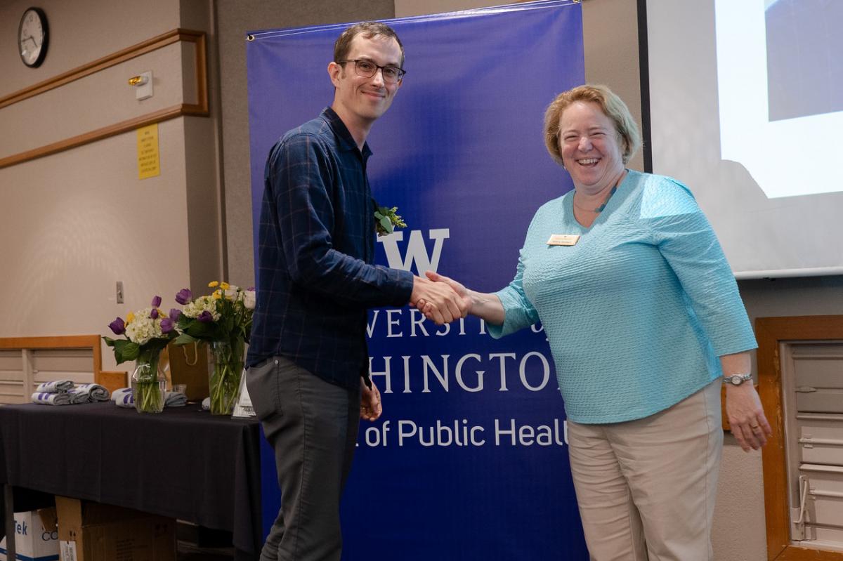 Christopher Kemp receives his award at the SPH Awards of Excellence