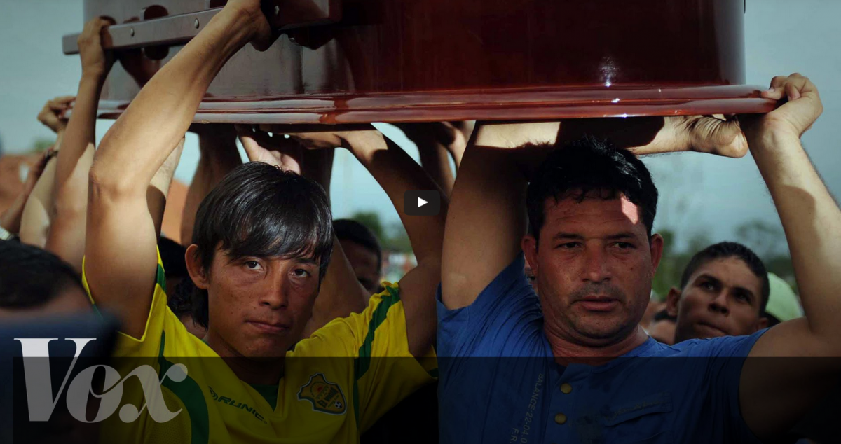 men carrying a coffin